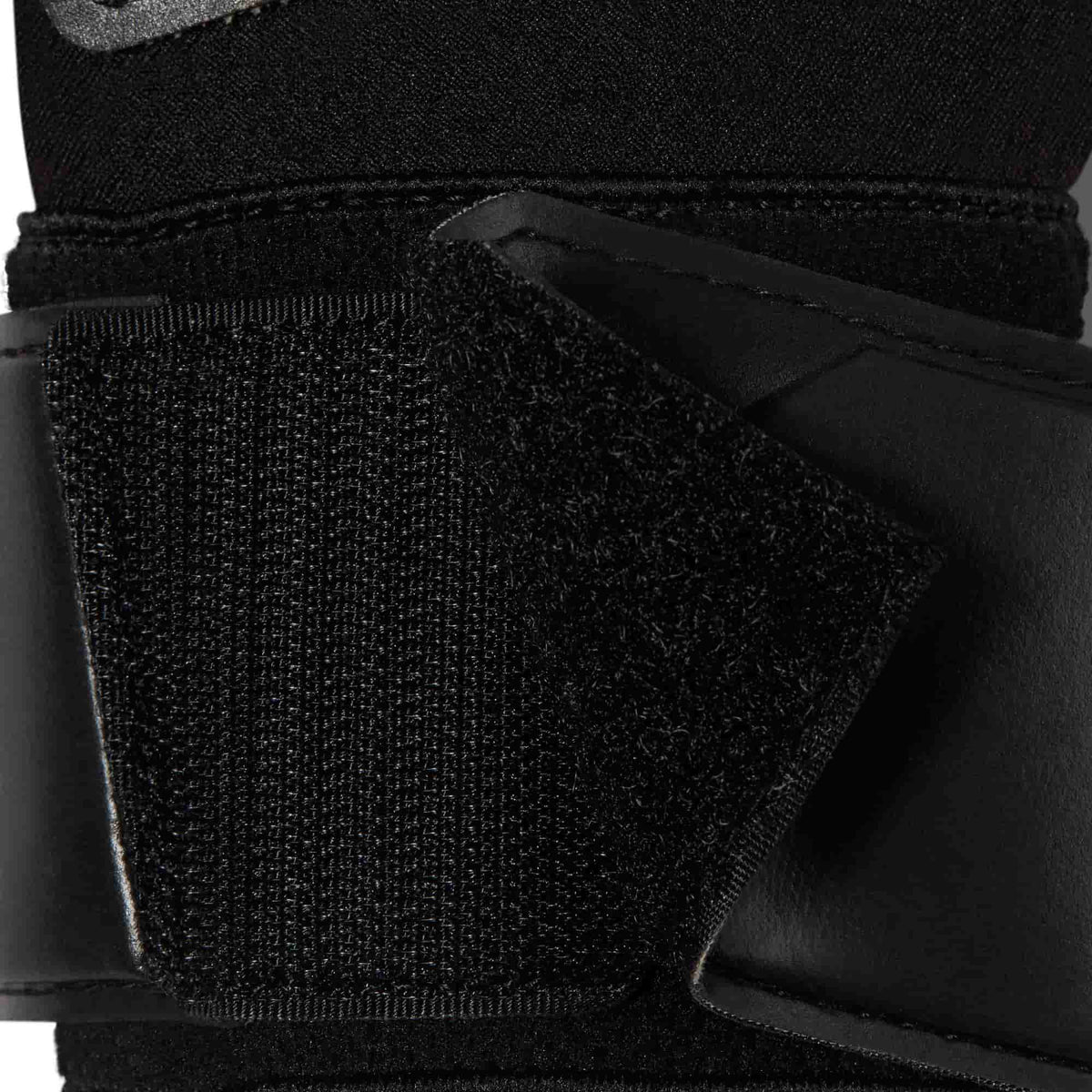 Nike Grip3 Soccer Gloves in black, red and beige with adjustable wrist strap.