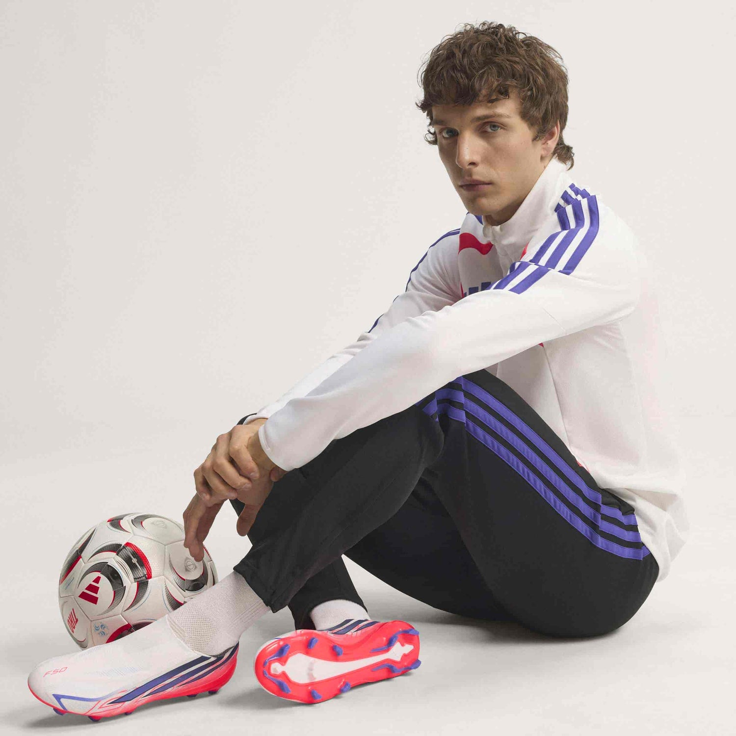 adidas F50 Hyperfast League Laceless FG soccer cleats in silver, navy and pink with firm-ground outsole
