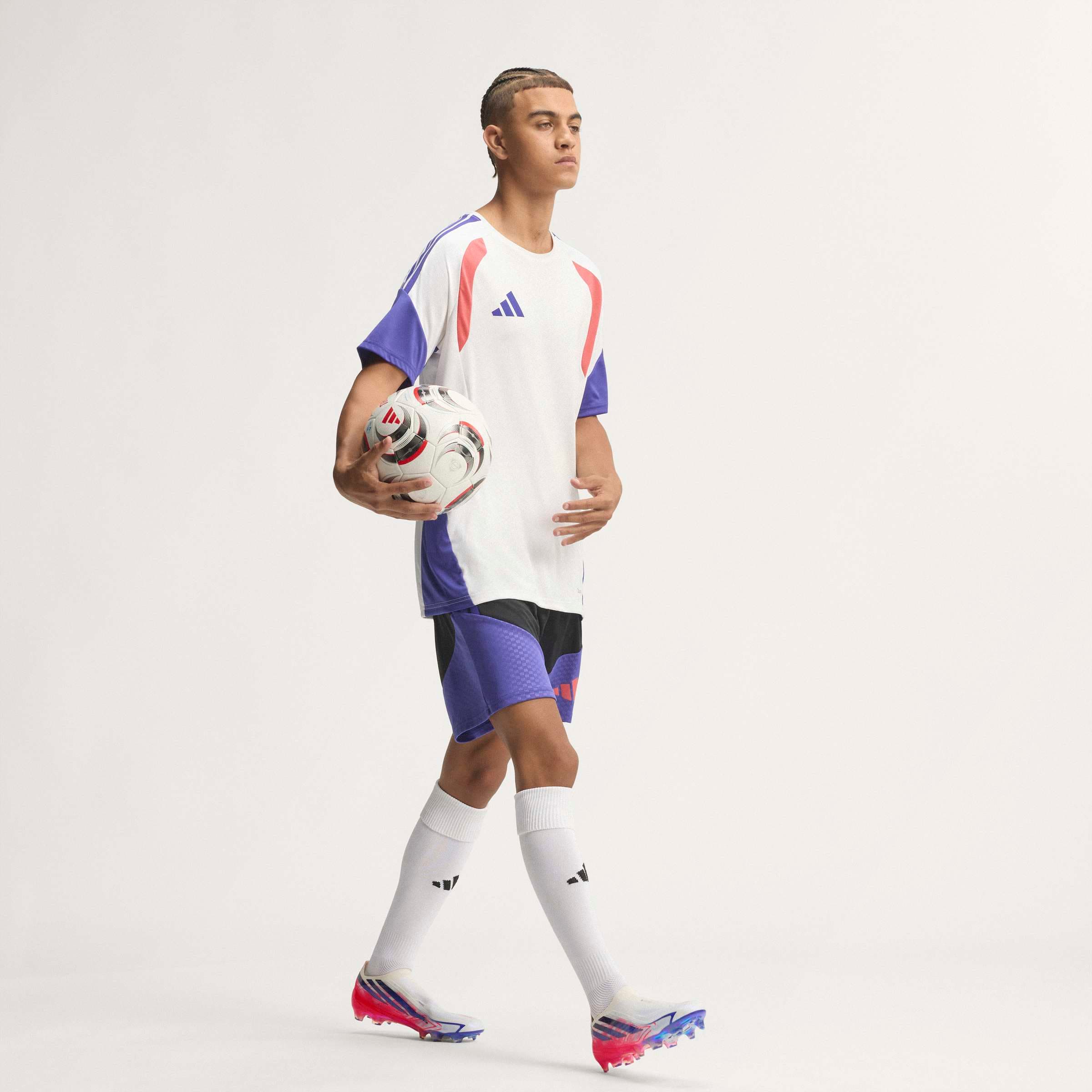 adidas F50 Hyperfast Elite Laceless FG soccer cleats in pink, white and navy with laceless HALOSKIN+ upper